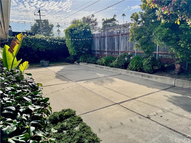 view of patio with fence