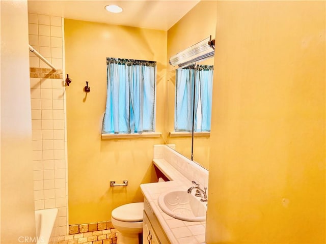 full bathroom featuring toilet and vanity