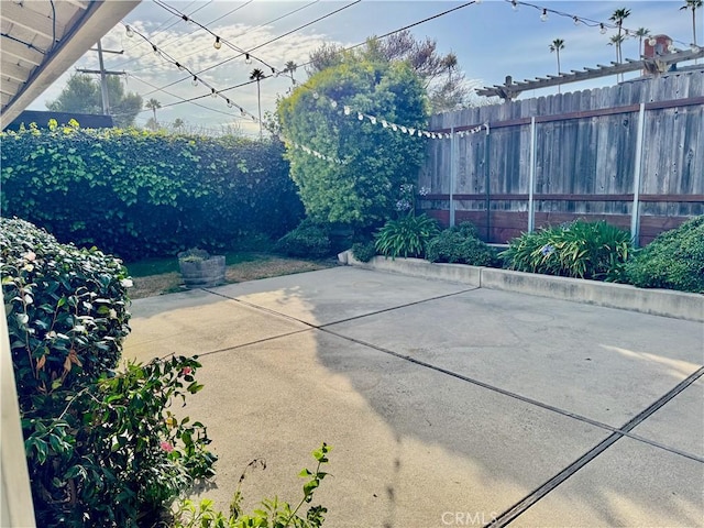 view of patio / terrace with fence