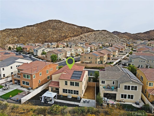 drone / aerial view featuring a mountain view