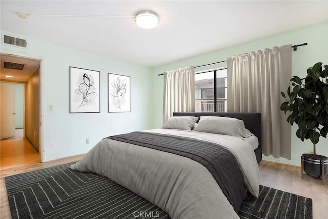 bedroom featuring light hardwood / wood-style floors