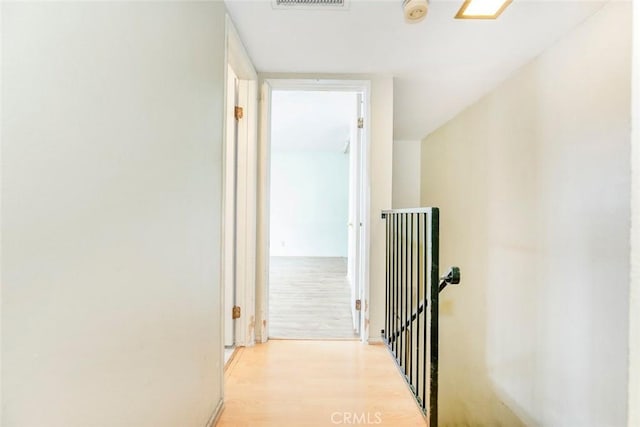 hall featuring light hardwood / wood-style floors