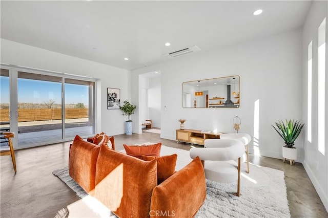 living room with concrete floors