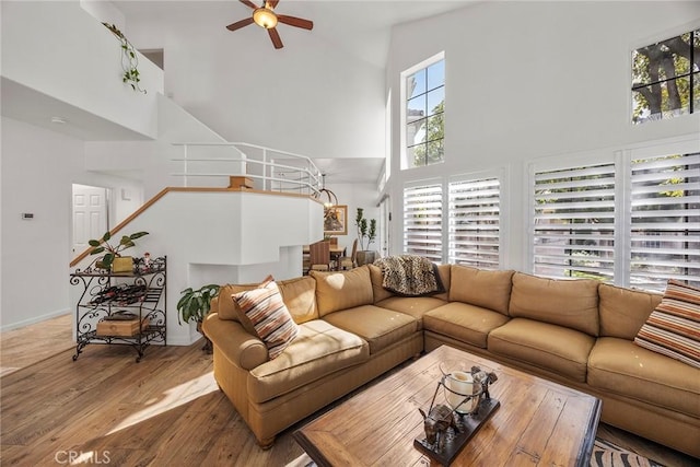 230 Shorebreaker Dr, Laguna Niguel, CA 92677 - living room with a towering ceiling, wood-type flooring, and ceiling fan
