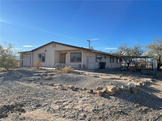 view of front of home with stucco siding