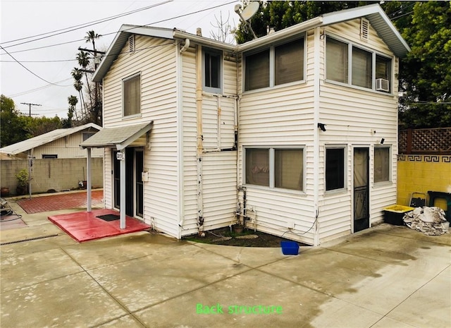 back of house featuring a patio