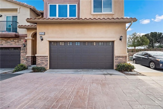 view of front of property with a garage