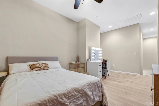 bedroom featuring ceiling fan, recessed lighting, visible vents, baseboards, and light wood finished floors