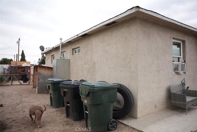 view of property exterior featuring cooling unit