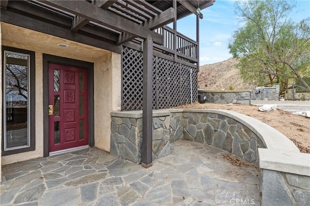 property entrance with a mountain view