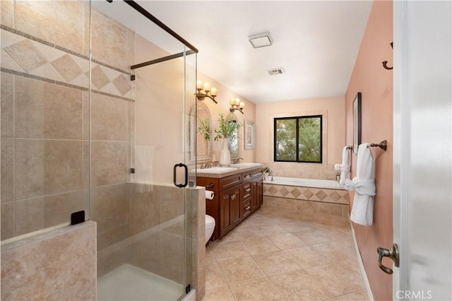 full bathroom featuring tile patterned flooring, shower with separate bathtub, vanity, and toilet