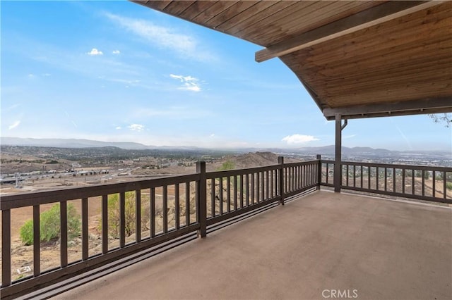 balcony featuring a mountain view