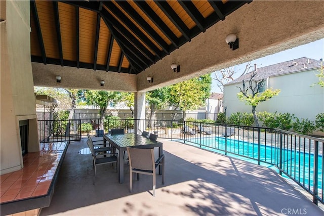 view of patio / terrace featuring a fenced in pool