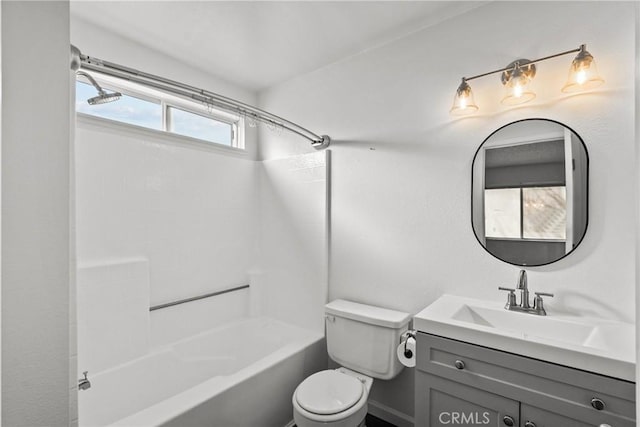 full bathroom with vanity, washtub / shower combination, and toilet