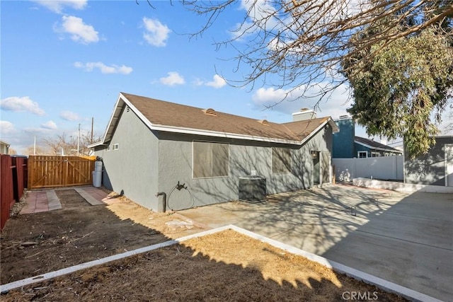 rear view of property featuring a patio area