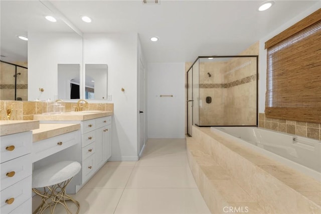 bathroom featuring tile patterned flooring, plus walk in shower, vanity, and decorative backsplash