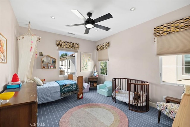 bedroom featuring carpet floors and ceiling fan