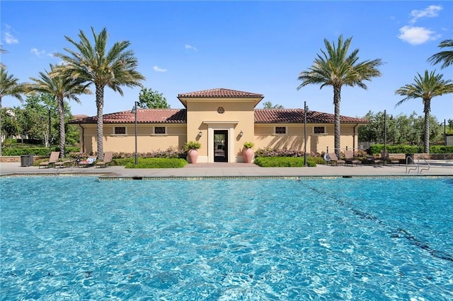 view of pool featuring a patio area