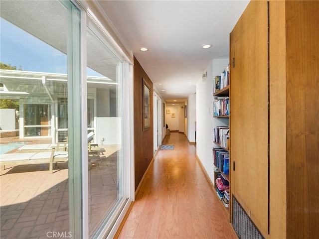 corridor featuring hardwood / wood-style flooring