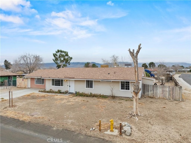 single story home with a mountain view