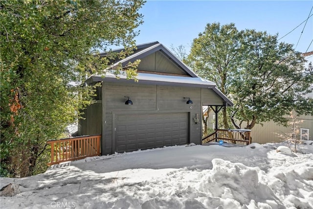 view of snow covered garage