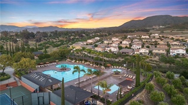 aerial view at dusk with a mountain view