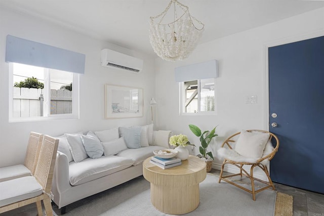 living room featuring an inviting chandelier and a wall mounted air conditioner