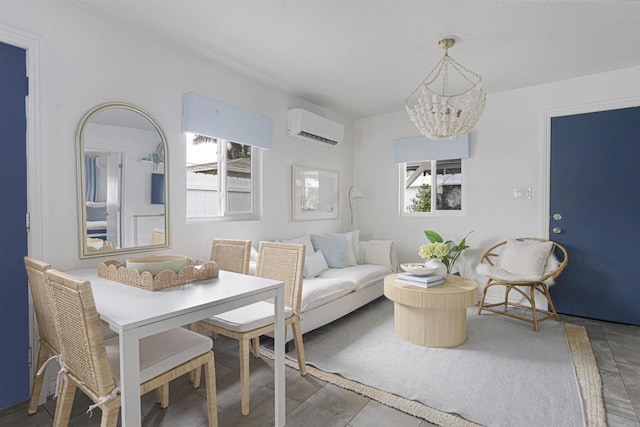 interior space featuring a wall mounted air conditioner and a chandelier