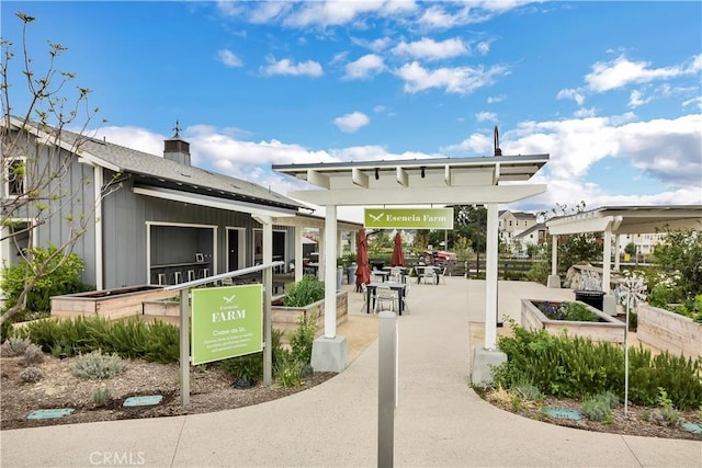 view of property's community with a pergola