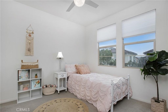 bedroom featuring ceiling fan and carpet flooring