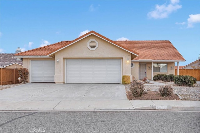 single story home featuring a garage