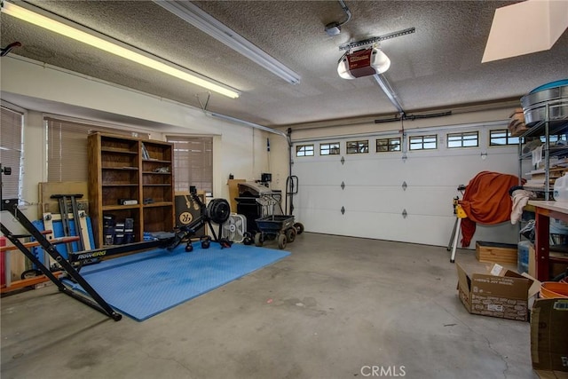 garage featuring a garage door opener