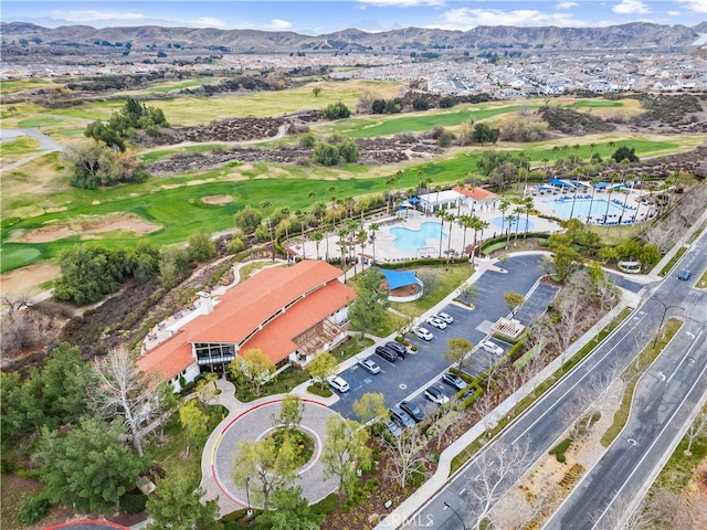 birds eye view of property featuring a mountain view