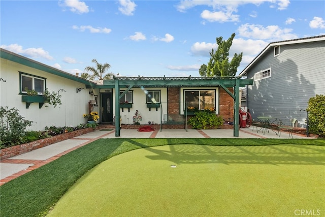 rear view of property with a patio area