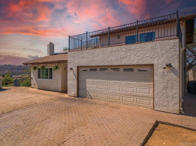 view of front of property featuring a garage