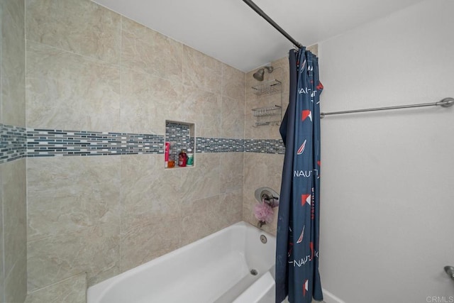 bathroom with shower / tub combo with curtain