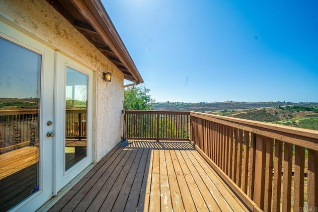 wooden deck with french doors