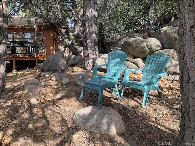 view of yard featuring a deck