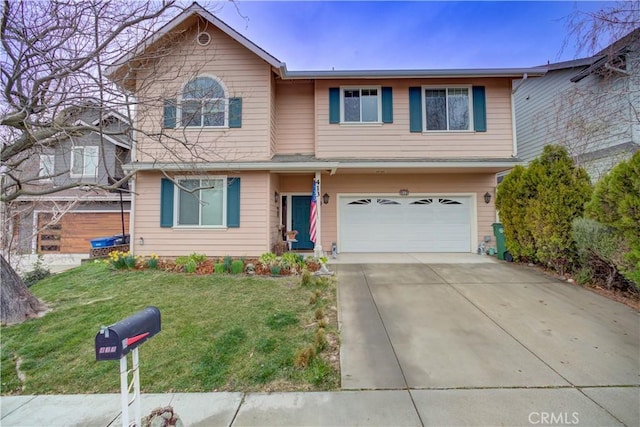 view of front of home with a garage and a front lawn