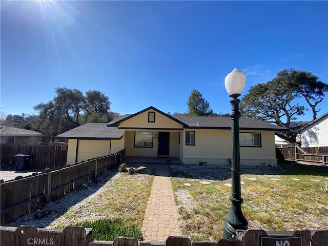 view of front of property with a front lawn