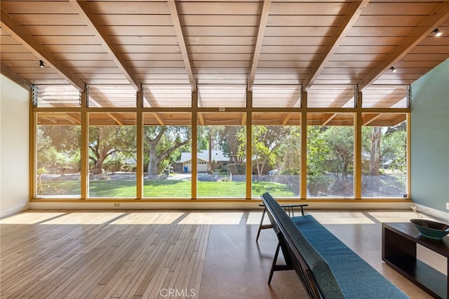 unfurnished sunroom featuring wooden ceiling