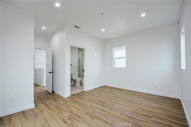 empty room with light wood-type flooring