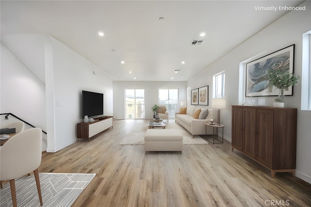 living room featuring light wood-type flooring