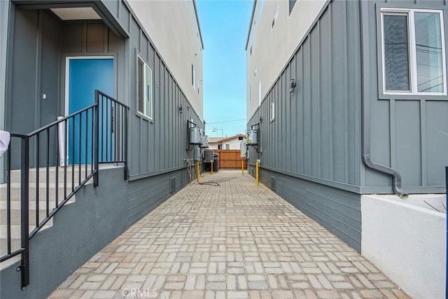 view of side of property featuring a patio