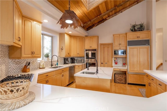 42848 Eagle Flight Pl, Big Bear Lake, CA 92315 - kitchen featuring built in appliances, light brown cabinetry, sink, and hanging light fixtures