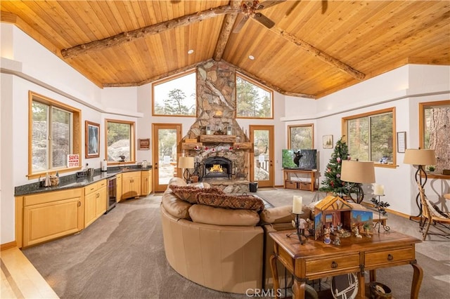 42848 Eagle Flight Pl, Big Bear Lake, CA 92315 - living room featuring beam ceiling, wood ceiling, high vaulted ceiling, beverage cooler, and a fireplace