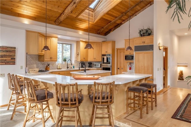 42848 Eagle Flight Pl, Big Bear Lake, CA 92315 - kitchen featuring stainless steel appliances, wooden ceiling, decorative light fixtures, and light brown cabinets