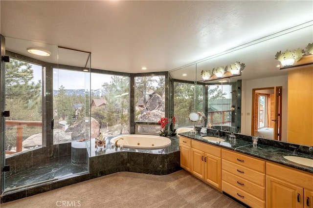 42848 Eagle Flight Pl, Big Bear Lake, CA 92315 - bathroom featuring vanity and tiled tub