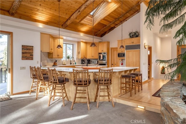 42848 Eagle Flight Pl, Big Bear Lake, CA 92315 - kitchen featuring a kitchen island, backsplash, hanging light fixtures, light brown cabinets, and wooden ceiling
