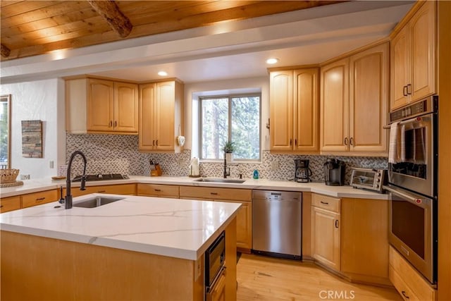 42848 Eagle Flight Pl, Big Bear Lake, CA 92315 - kitchen featuring an island with sink, stainless steel appliances, and sink